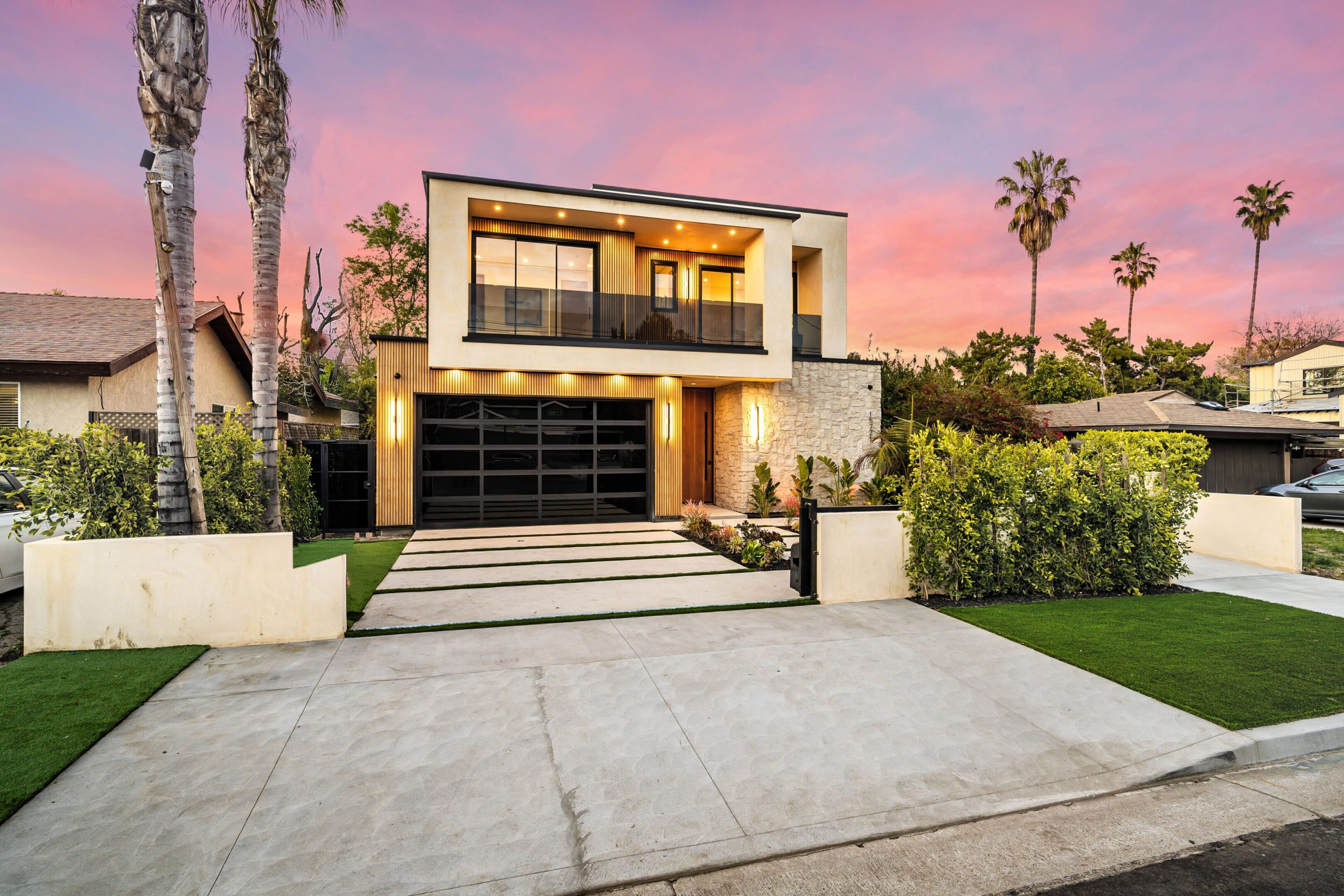 Modern house with sunset sky background.