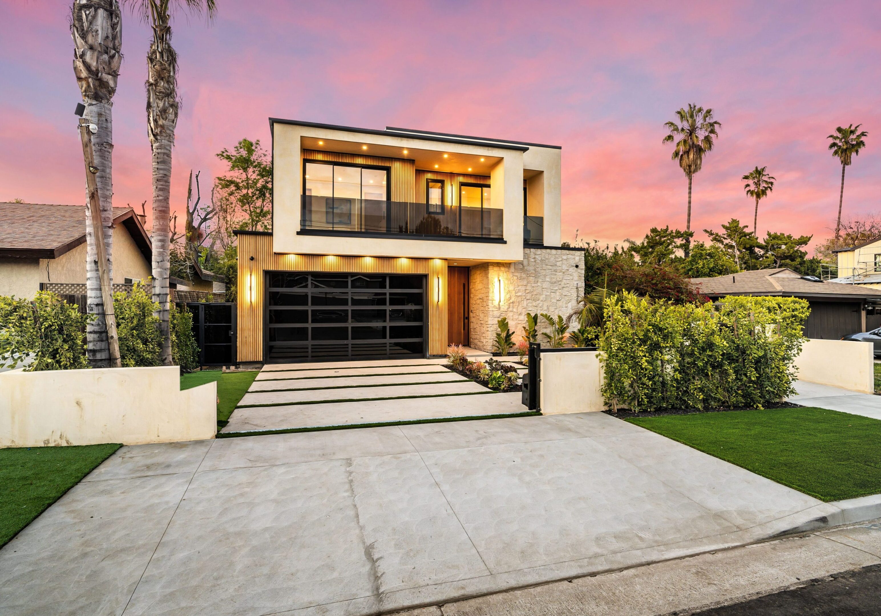 Modern house with sunset sky background.